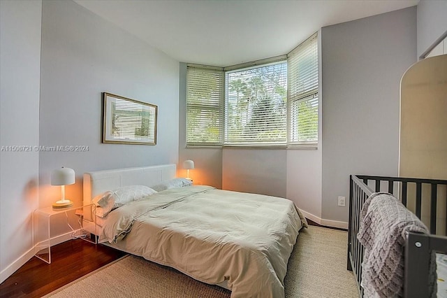 bedroom featuring hardwood / wood-style floors