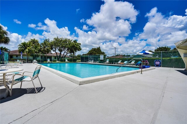 view of pool with a patio