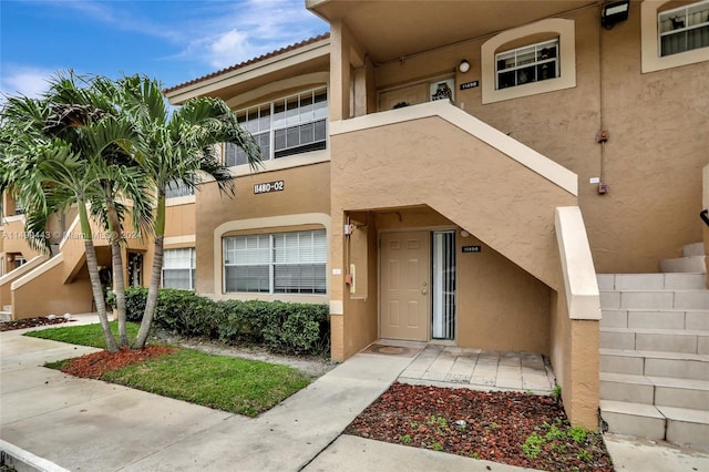 doorway to property with a balcony