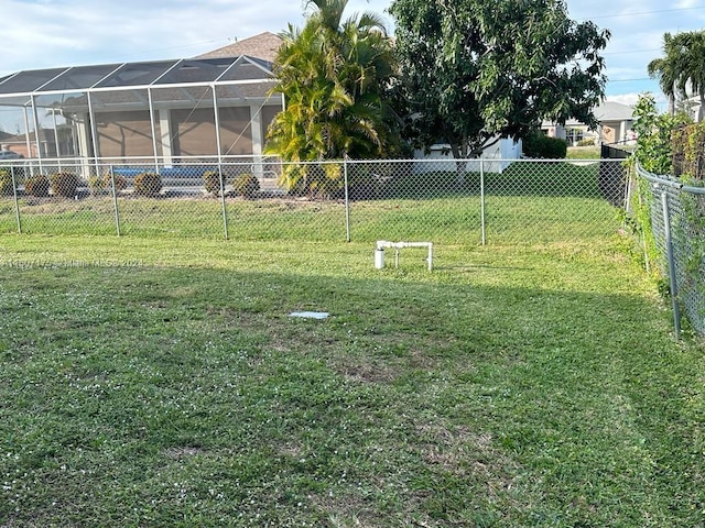 view of yard with a lanai