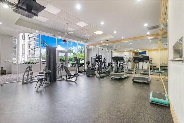 exercise room featuring recessed lighting, ceiling fan, and a paneled ceiling
