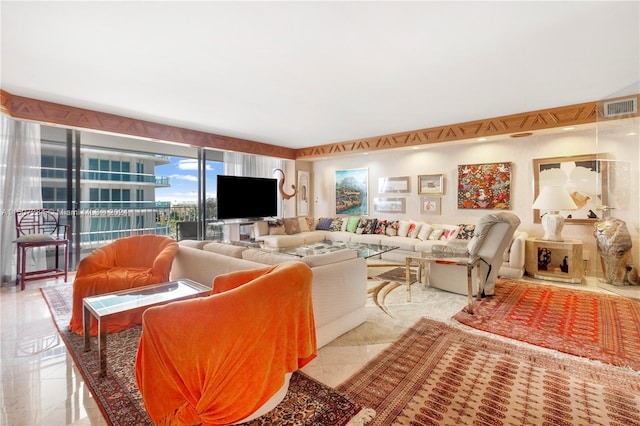 living room with light tile patterned floors