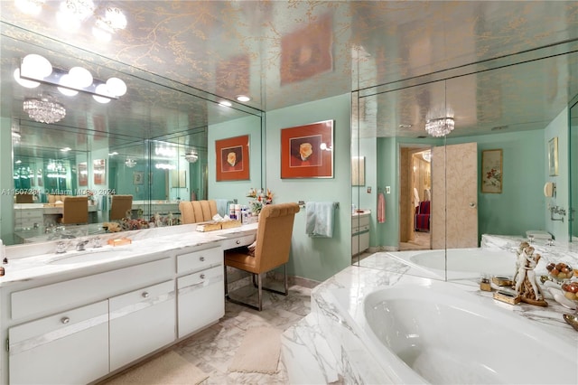 bathroom featuring vanity, tile patterned flooring, and tiled bath