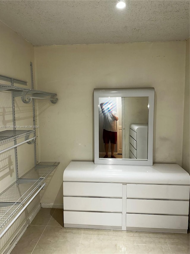 interior space with light tile patterned floors