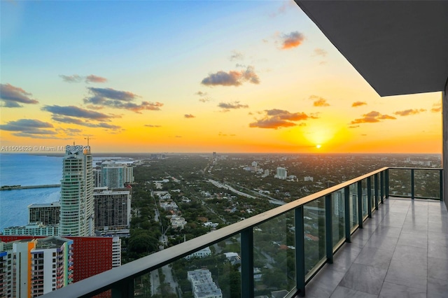 balcony at dusk with a water view