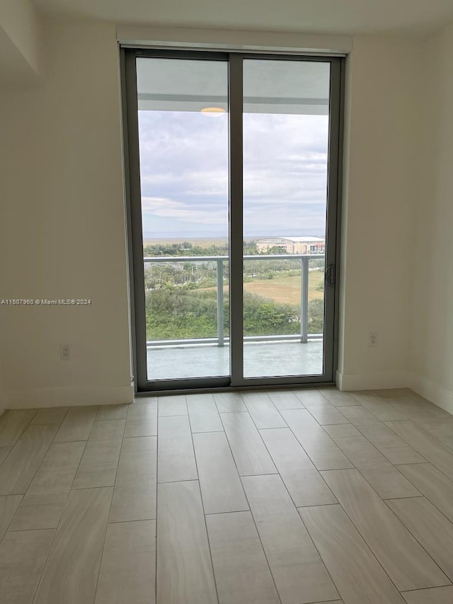 view of tiled spare room