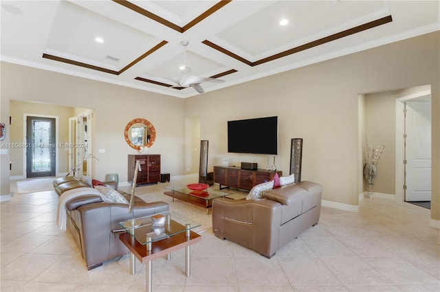 living room featuring ceiling fan, light tile patterned floors, crown molding, and coffered ceiling