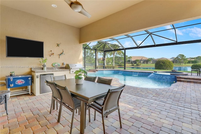 view of pool featuring an in ground hot tub, a water view, area for grilling, and ceiling fan