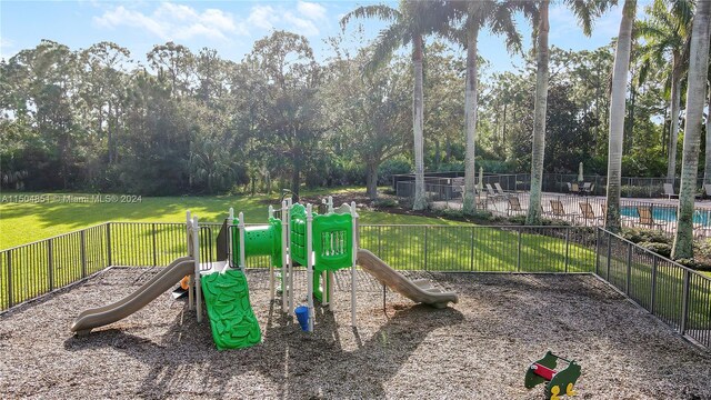 view of jungle gym featuring a yard