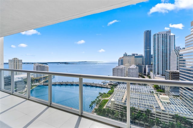 balcony featuring a water view