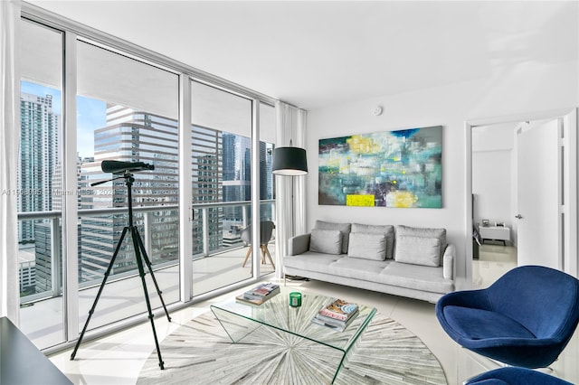 living room featuring floor to ceiling windows