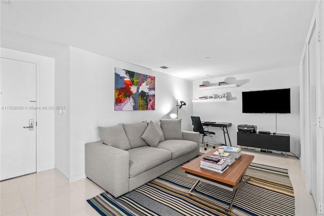 living room with light tile floors