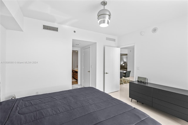 bedroom with light hardwood / wood-style floors