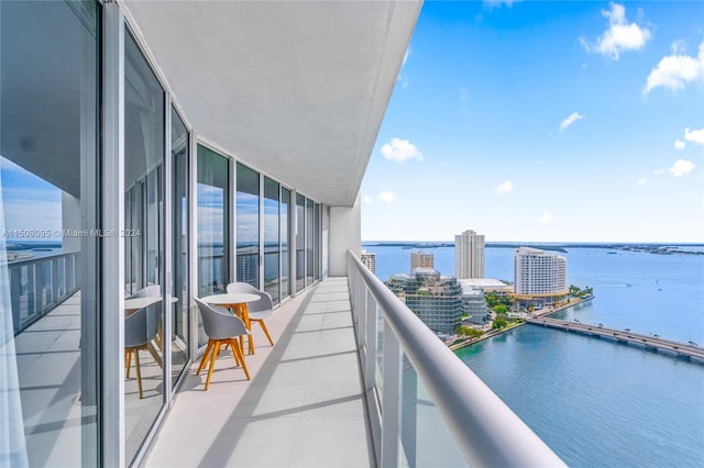 balcony featuring a water view