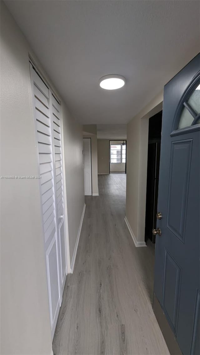 hall featuring light wood-type flooring