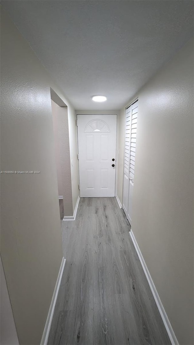 hall featuring light hardwood / wood-style floors