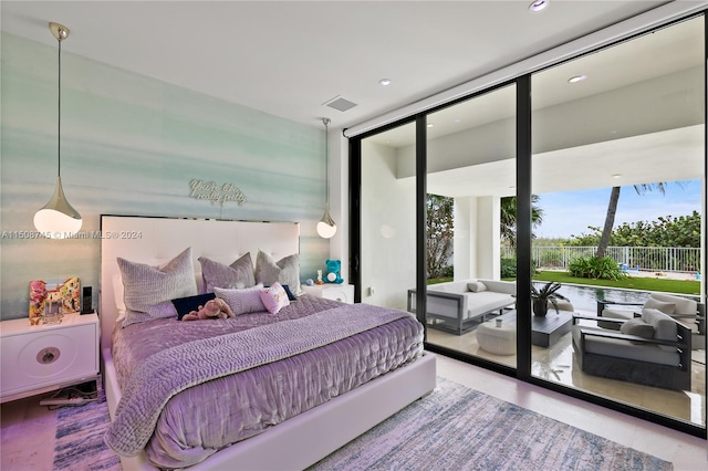 bedroom with a wall of windows