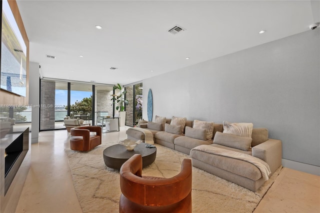 living room with a wall of windows