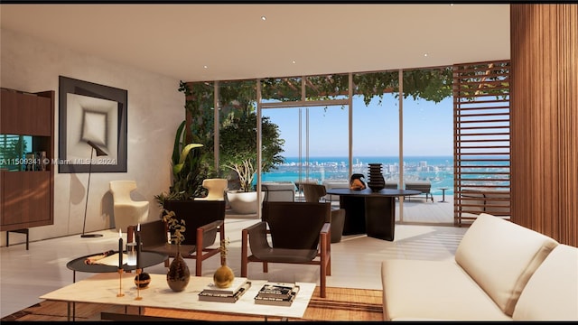 living room featuring a water view, expansive windows, and light wood-type flooring