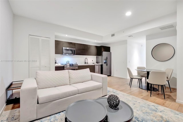 living room with light wood-type flooring