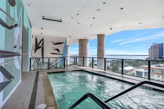 view of pool featuring a hot tub