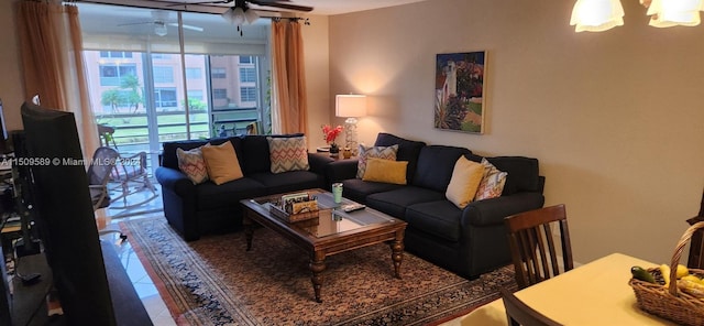 living room featuring tile flooring and ceiling fan