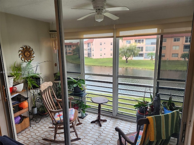 sunroom / solarium with ceiling fan