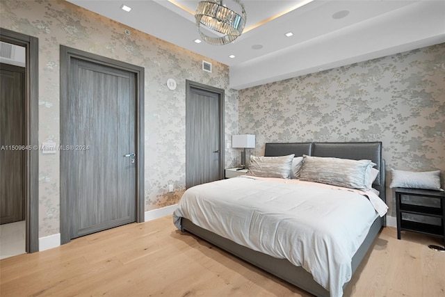 bedroom featuring light hardwood / wood-style floors