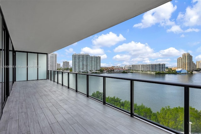 balcony featuring a water view