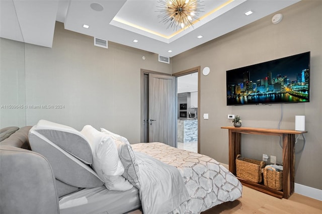 bedroom with light wood-type flooring