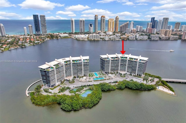 birds eye view of property featuring a water view