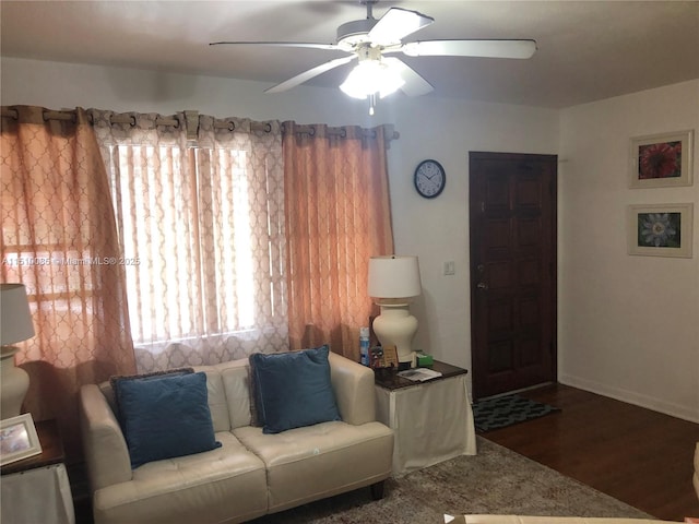 1256 NE 149th St, Miami, FL 33161 - living area featuring a ceiling fan, wood finished floors, and baseboards