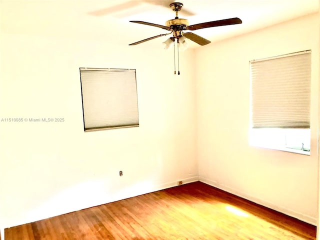 1256 NE 149th St, Miami, FL 33161 - empty room featuring ceiling fan and wood finished floors