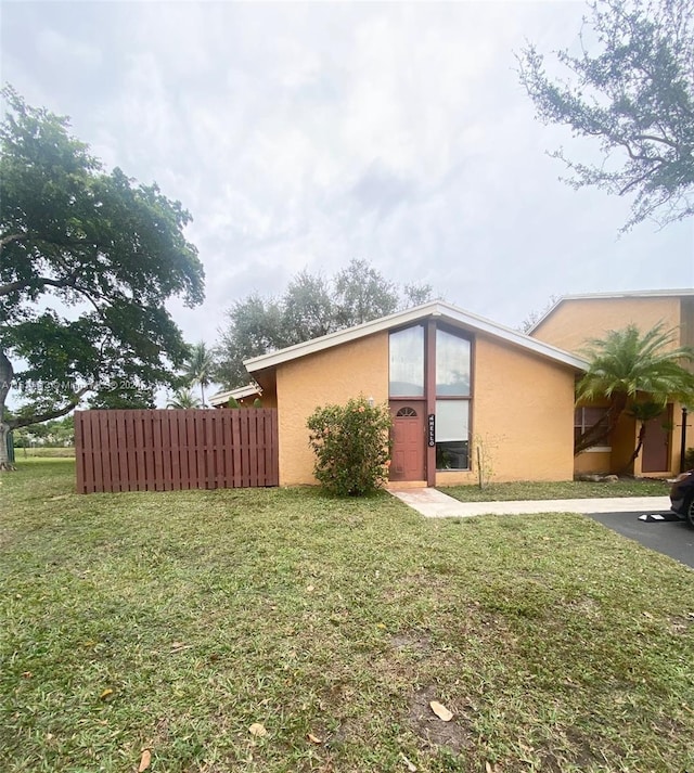 exterior space with a lawn