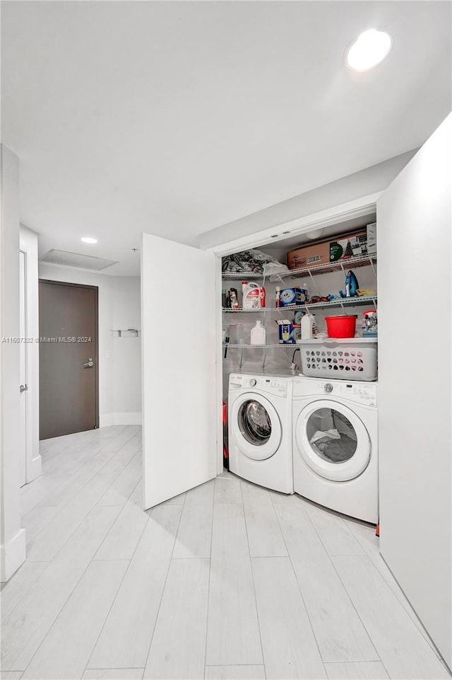 laundry room featuring independent washer and dryer