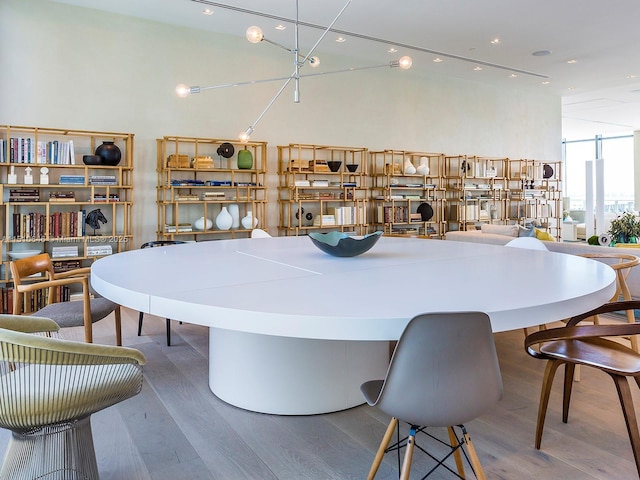 dining area with hardwood / wood-style floors