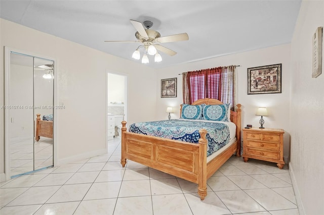 bedroom with a closet, ceiling fan, and light tile patterned floors