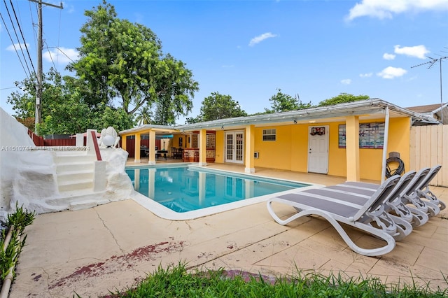 view of pool featuring a patio area