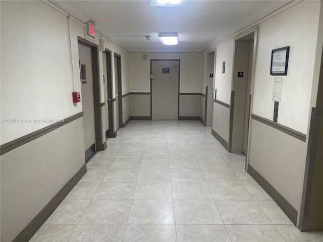 hallway with light tile flooring