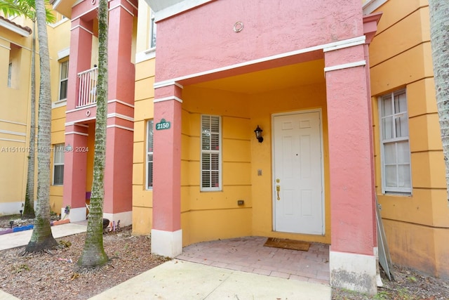 doorway to property with a balcony