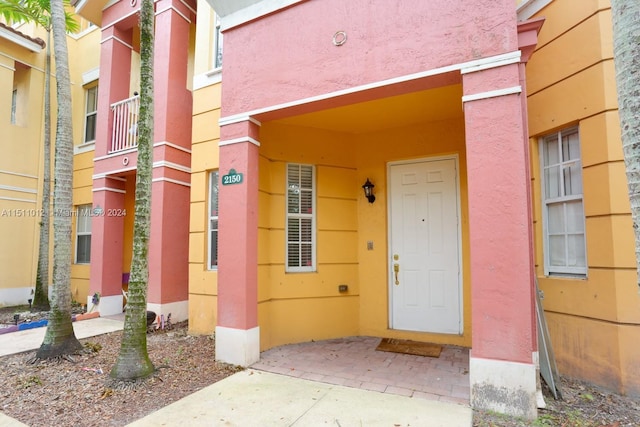 2150 Shoma Dr Unit 226, Royal Palm Beach, FL 33414 - view of exterior entry featuring stucco siding