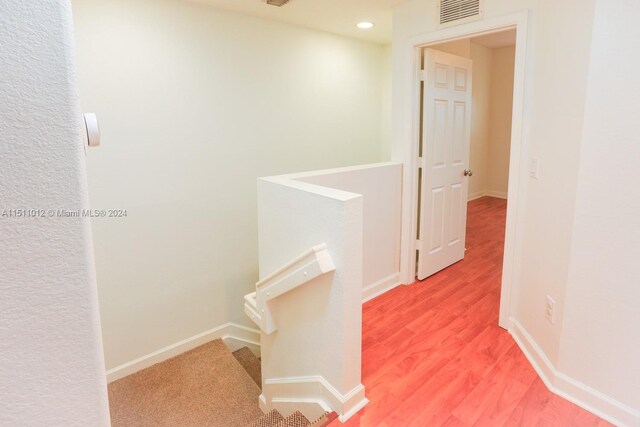 2150 Shoma Dr Unit 226, Royal Palm Beach, FL 33414 - hallway featuring light wood finished floors, recessed lighting, and baseboards