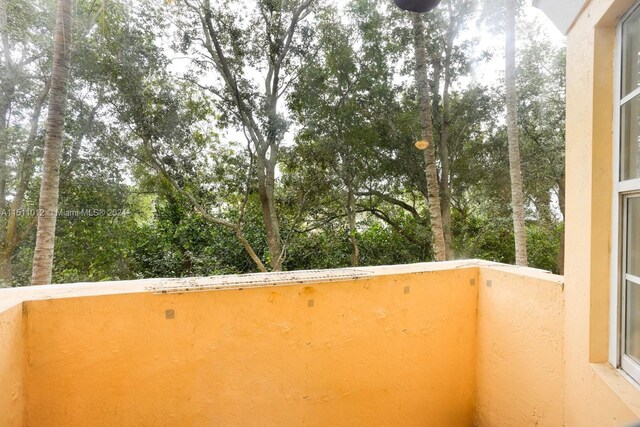 2150 Shoma Dr Unit 226, Royal Palm Beach, FL 33414 - balcony featuring view of wooded area