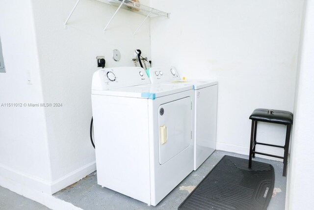 2150 Shoma Dr Unit 226, Royal Palm Beach, FL 33414 - laundry room with washer and dryer and baseboards