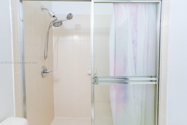 bathroom with an enclosed shower