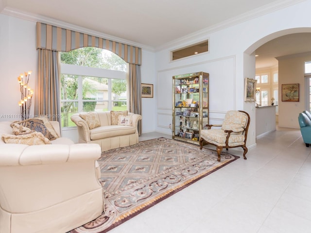 living room with ornamental molding