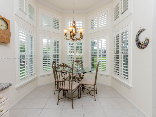 dining room featuring light tile patterned floors, an inviting chandelier, and ornamental molding