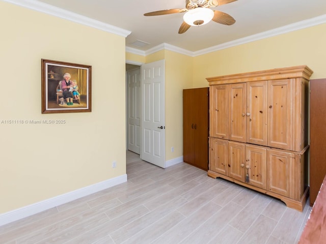 unfurnished bedroom featuring ceiling fan, a closet, light wood-type flooring, and ornamental molding