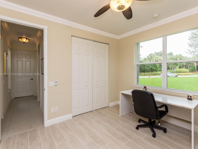 home office with ceiling fan and ornamental molding