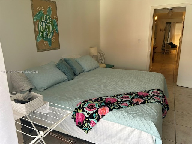 bedroom with tile patterned floors